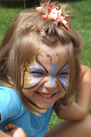 Girl with butterfly face paint